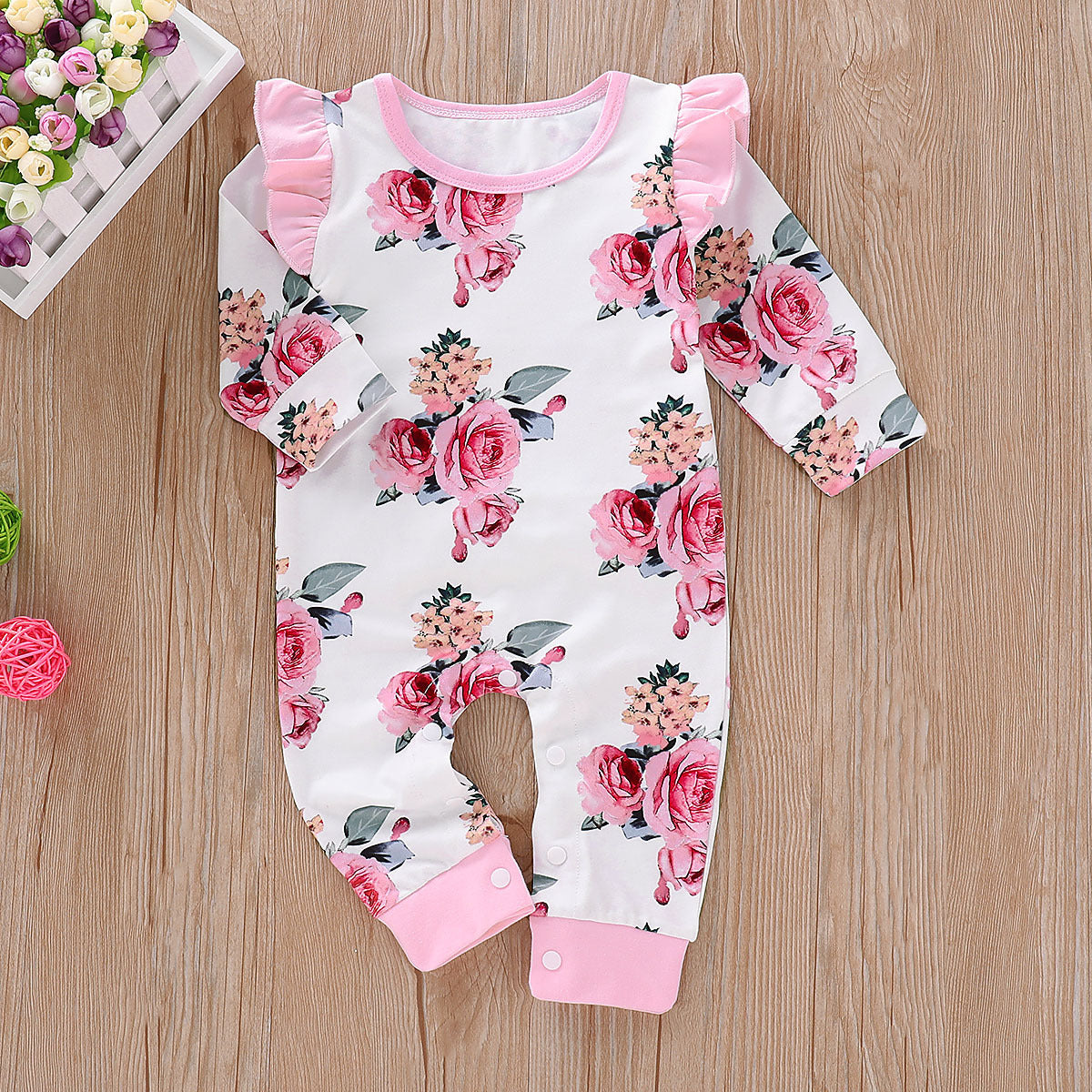 Baby Pink Flower Jumpsuit with Long Sleeves, Frills and Floral Pattern