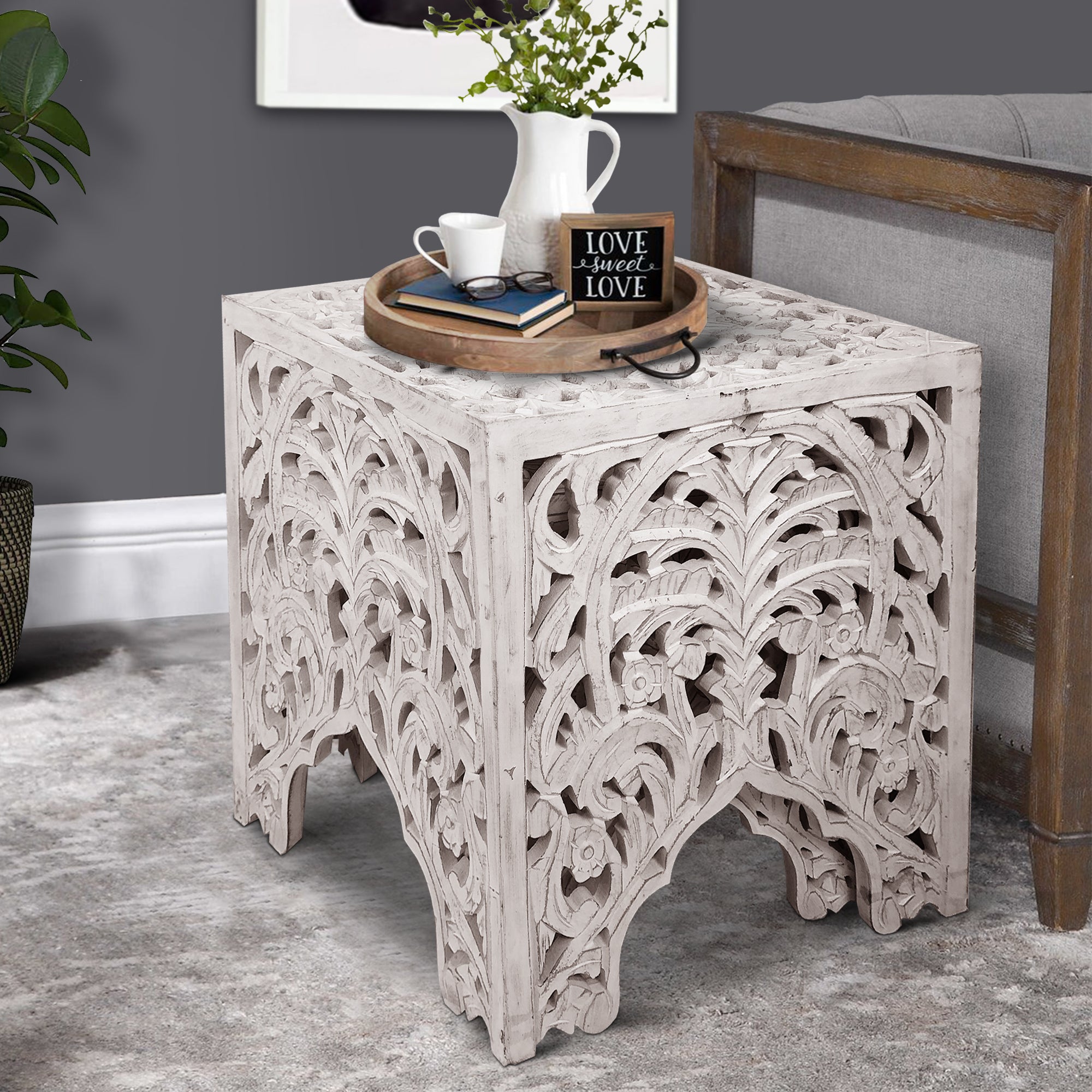 Wood table with floral cutouts